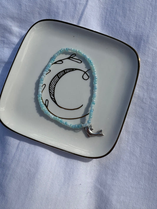 Seed bead dolphin charm bracelet