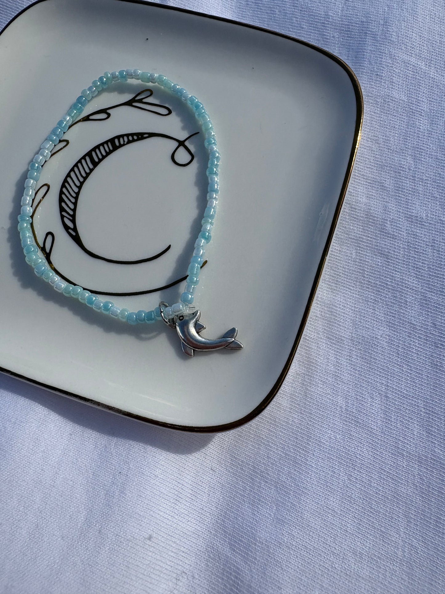 Seed bead dolphin charm bracelet