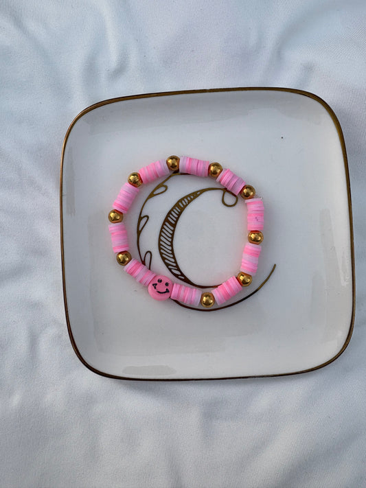 Pink smiley face bracelet