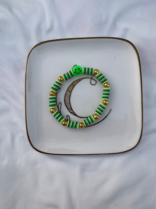 Green smiley face bracelet