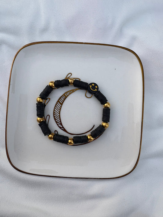 Black and gold smiley face bracelet
