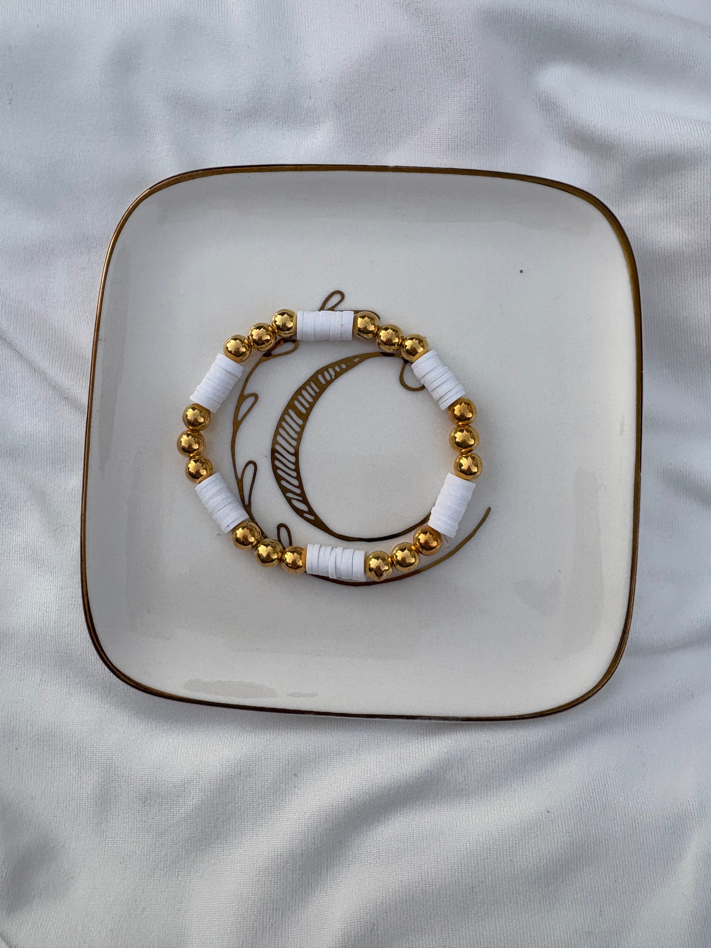 Gold and white beaded bracelet