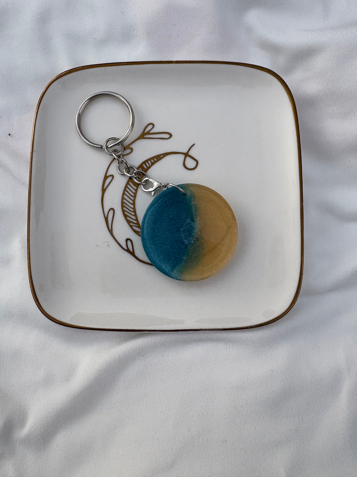 Blue and gold resin keychain