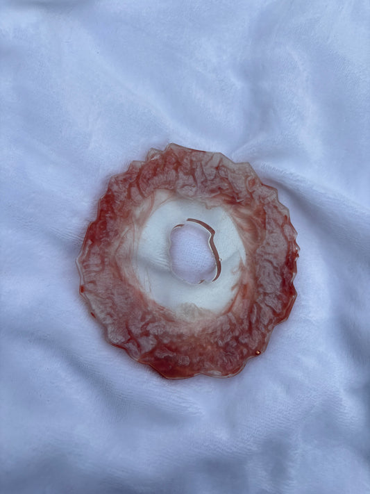 Red and silver resin coaster